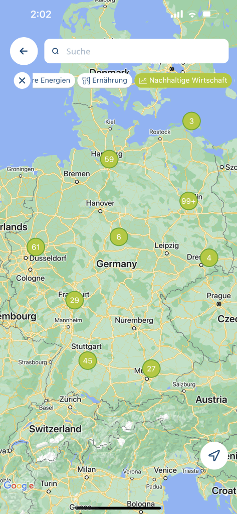 App screen showing a clustered Google Maps view of sustainable partner companies